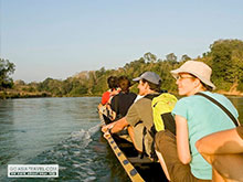 Boating to the Tad Sae Waterfall